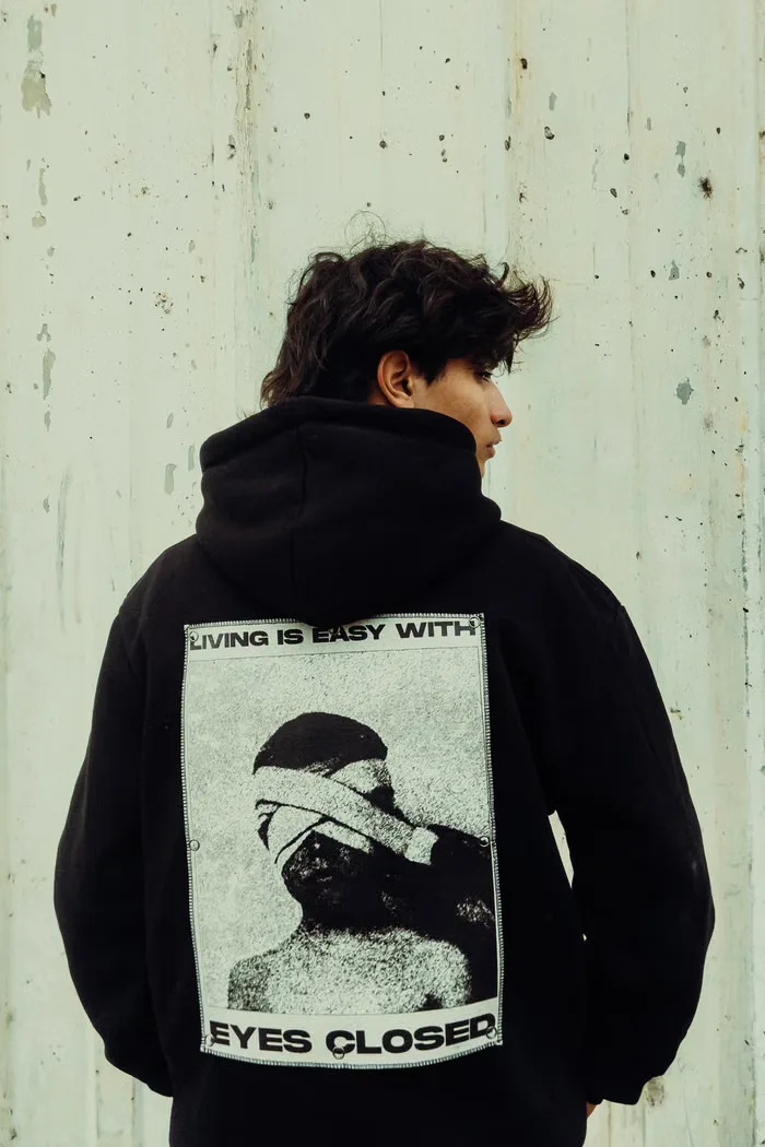 Heritage Pullover Hoodie in black, front view on model